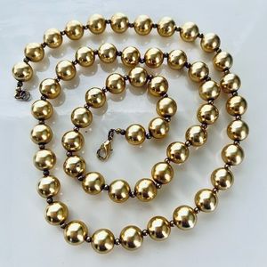 The look is golden. 31” single strand